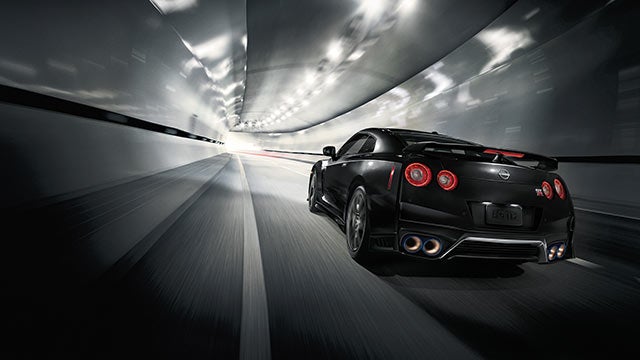 2023 Nissan GT-R seen from behind driving through a tunnel | Gates Nissan of Richmond in Richmond KY